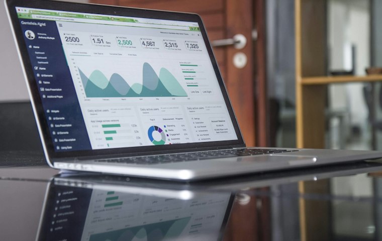 Laptop showing a marketing analytics dashboard
